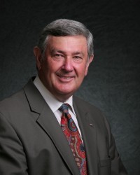 Dennis A. Schoville  Chairman of the Board